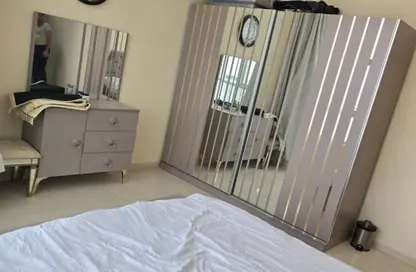 شقة - غرفة نوم - 2 حمامات للبيع في أورينت تاور 1 - أورينت تاور - البستان - عجمان