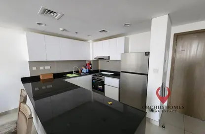 Kitchen image for: Apartment - 2 Bedrooms - 2 Bathrooms for rent in The Pulse - Dubai South (Dubai World Central) - Dubai, Image 1