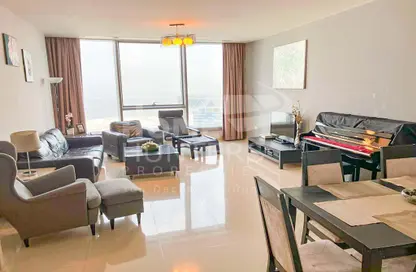 Living / Dining Room image for: Apartment - 2 Bedrooms - 4 Bathrooms for sale in Sky Tower - Shams Abu Dhabi - Al Reem Island - Abu Dhabi, Image 1