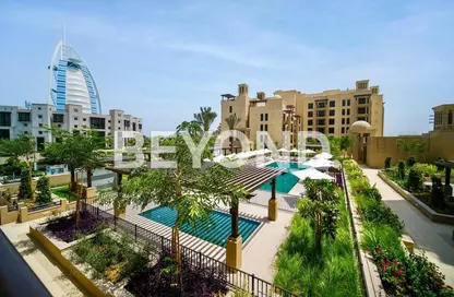 Pool image for: Apartment - 2 Bedrooms - 2 Bathrooms for sale in Lamaa - Madinat Jumeirah Living - Umm Suqeim - Dubai, Image 1
