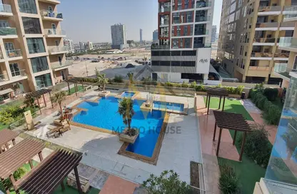 Pool image for: Apartment - 1 Bathroom for sale in Sherena Residence - Majan - Dubai, Image 1