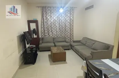 Living / Dining Room image for: Apartment - 1 Bedroom - 2 Bathrooms for rent in Ajman Corniche Road - Ajman, Image 1