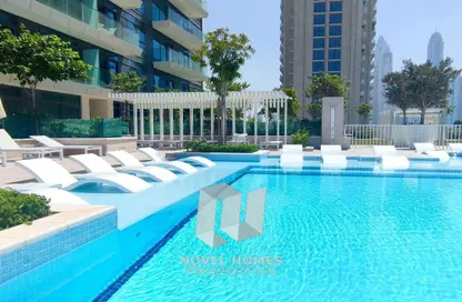 Pool image for: Apartment - 2 Bedrooms - 2 Bathrooms for rent in Beach Vista - EMAAR Beachfront - Dubai Harbour - Dubai, Image 1