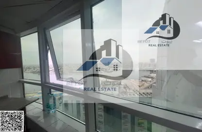 شقة - غرفة نوم - 2 حمامات للايجار في أورينت تاور 1 - أورينت تاور - البستان - عجمان
