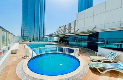 Apartment - 3 Bedrooms - 5 Bathrooms for rent in Golden Falcon Tower - Hamdan Street - Abu Dhabi