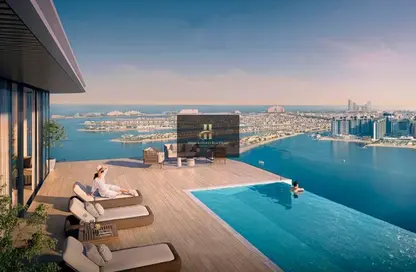 Pool image for: Apartment - 4 Bedrooms - 4 Bathrooms for sale in Seapoint - EMAAR Beachfront - Dubai Harbour - Dubai, Image 1