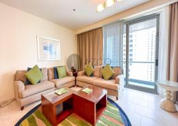 Living Room image for: Apartment - 2 bedrooms - 3 bathrooms for rent in Blue Beach Tower - Jumeirah Beach Residence - Dubai, Image 1
