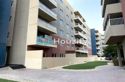 Outdoor Building image for: Apartment - 2 Bedrooms - 2 Bathrooms for sale in Tower 12 - Al Reef Downtown - Al Reef - Abu Dhabi, Image 1