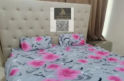 شقة - غرفة نوم - 2 حمامات للايجار في أورينت تاور 1 - أورينت تاور - البستان - عجمان