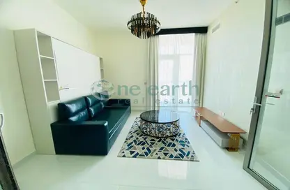 Living Room image for: Apartment - 1 Bedroom - 2 Bathrooms for sale in Miraclz Tower by Danube - Arjan - Dubai, Image 1
