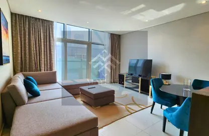 Living / Dining Room image for: Apartment - 2 Bedrooms - 3 Bathrooms for rent in Bay's Edge - Business Bay - Dubai, Image 1