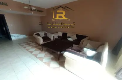 Living Room image for: Apartment - 2 Bedrooms - 2 Bathrooms for rent in Ajman Gate Tower - Ajman Industrial 2 - Ajman Industrial Area - Ajman, Image 1