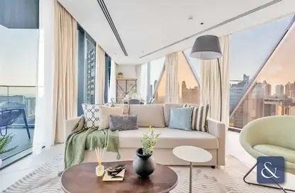 Living Room image for: Apartment - 3 Bedrooms - 5 Bathrooms for sale in Marquise Square Tower - Business Bay - Dubai, Image 1