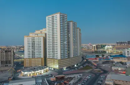 Outdoor Building image for: Apartment - 2 Bedrooms - 2 Bathrooms for sale in Tower A1 - Ajman Pearl Towers - Ajman Downtown - Ajman, Image 1