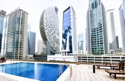 صورة لـ حوض سباحة شقة - 2 غرف نوم - 2 حمامات للايجار في برج أونتاريو - الخليج التجاري - دبي ، صورة رقم 1