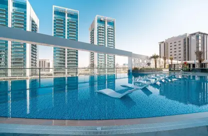 صورة لـ حوض سباحة شقة - 1 حمام للبيع في بيلا روز - جنوب البرشاء - البرشاء - دبي ، صورة رقم 1