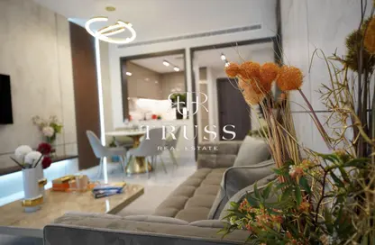 Living / Dining Room image for: Apartment - 1 Bedroom - 2 Bathrooms for sale in Adhara Star - Arjan - Dubai, Image 1