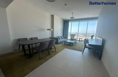 Living / Dining Room image for: Apartment - 2 Bedrooms - 3 Bathrooms for rent in Hilliana Tower - Acacia Avenues - Al Sufouh - Dubai, Image 1