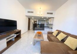 Living Room image for: Apartment - 1 bedroom - 2 bathrooms for rent in Chaimaa Premiere - Jumeirah Village Circle - Dubai, Image 1