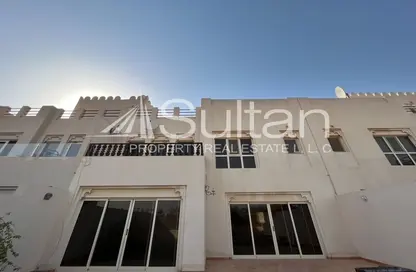 Outdoor Building image for: Townhouse - 3 Bedrooms - 3 Bathrooms for sale in The Townhouses at Al Hamra Village - Al Hamra Village - Ras Al Khaimah, Image 1