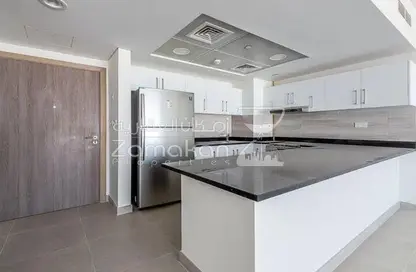 صورة لـ مطبخ شقة - 2 غرف نوم - 3 حمامات للبيع في سوهو سكوير - جزيرة السعديات - أبوظبي ، صورة رقم 1