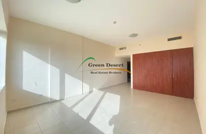 Empty Room image for: Apartment - 2 Bedrooms - 3 Bathrooms for sale in Olympic Park 4 - Olympic Park Towers - Dubai Sports City - Dubai, Image 1
