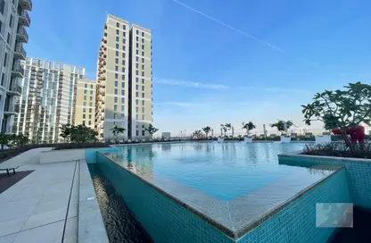 صورة لـ حوض سباحة شقة - غرفة نوم - 2 حمامات للايجار في برج سوشيو - دبي هيلز استيت - دبي ، صورة رقم 1