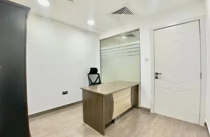 Office Space - Studio - 4 Bathrooms for rent in Hamdan Street - Abu Dhabi