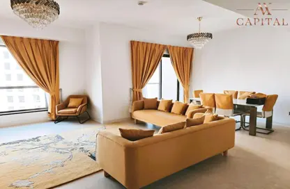 Living / Dining Room image for: Apartment - 2 Bedrooms - 3 Bathrooms for rent in Shams 4 - Shams - Jumeirah Beach Residence - Dubai, Image 1