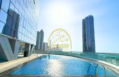 صورة لـ حوض سباحة شقة - غرفة نوم - 2 حمامات للايجار في برج الجوهرة - شارع الكورنيش - أبوظبي ، صورة رقم 1