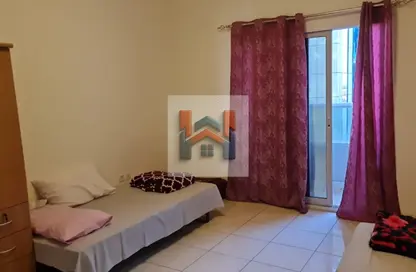 شقة - غرفة نوم - 2 حمامات للايجار في أورينت تاور 2 - أورينت تاور - البستان - عجمان