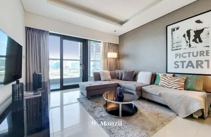 Living Room image for: Apartment - 1 Bedroom - 1 Bathroom for rent in Tower D - DAMAC Towers by Paramount - Business Bay - Dubai, Image 1