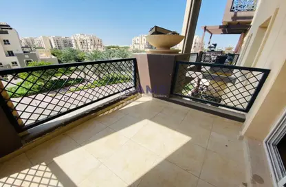 Balcony image for: Apartment - 2 Bedrooms - 2 Bathrooms for sale in Al Thamam 61 - Al Thamam - Remraam - Dubai, Image 1