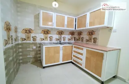صورة لـ مطبخ شقة - غرفة نوم - 1 حمام للايجار في المشرف - أبوظبي ، صورة رقم 1