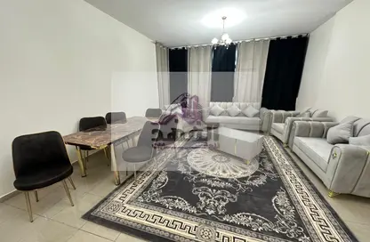 Living Room image for: Apartment - 2 Bedrooms - 3 Bathrooms for rent in Ajman Corniche Residences - Ajman Corniche Road - Ajman, Image 1
