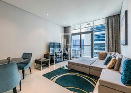 Living Room image for: Hotel and Hotel Apartment - 1 bedroom - 2 bathrooms for sale in Bay's Edge - Business Bay - Dubai, Image 1