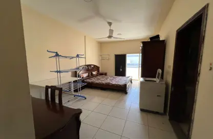 Room / Bedroom image for: Apartment - 1 Bathroom for rent in Al Nuaimiya - Ajman, Image 1