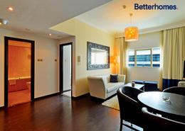 صورةغرفة المعيشة / غرفة الطعام لـ: شقة - 1 غرفة نوم - 2 حمامات للبيع في فيرست سنترال للشقق الفندقية - برشا هايتس (تيكوم) - دبي, صورة 1