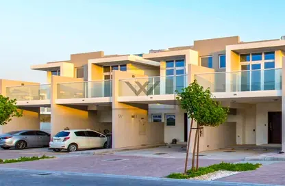 Outdoor Building image for: Townhouse - 3 Bedrooms - 3 Bathrooms for rent in Basswood - Damac Hills 2 - Dubai, Image 1
