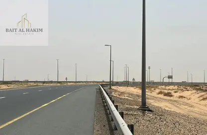 أرض - استوديو للبيع في روضة القرط - ضاحية الروضات - الشارقة