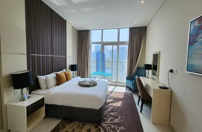 Room / Bedroom image for: Apartment - 2 Bedrooms - 2 Bathrooms for rent in Bay's Edge - Business Bay - Dubai, Image 1
