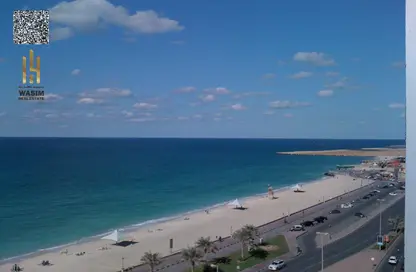 Apartment - 2 Bedrooms - 2 Bathrooms for sale in Corniche Tower - Ajman Corniche Road - Ajman