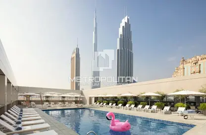 Pool image for: Apartment - 1 Bathroom for sale in Rove City Walk - City Walk - Dubai, Image 1