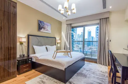 Room / Bedroom image for: Apartment - 1 Bedroom - 2 Bathrooms for rent in Elite Downtown Residence - Downtown Dubai - Dubai, Image 1