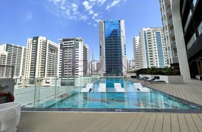 Pool image for: Apartment - 1 Bathroom for rent in Bayz by Danube - Business Bay - Dubai, Image 1