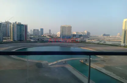 صورة لـ حوض سباحة شقة - 1 حمام للبيع في برج الواحة - مدينة دبي الرياضية - دبي ، صورة رقم 1