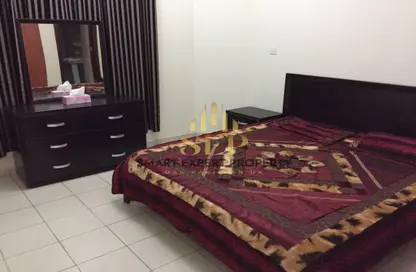 شقة - غرفة نوم - 1 حمام للايجار في سي15 - طراز الصين - المدينة الدولية - دبي