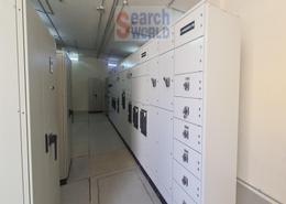 صورةمطبخ لـ: مصنع - 8 حمامات للبيع في كيزاد - السمحة - أبوظبي, صورة 1