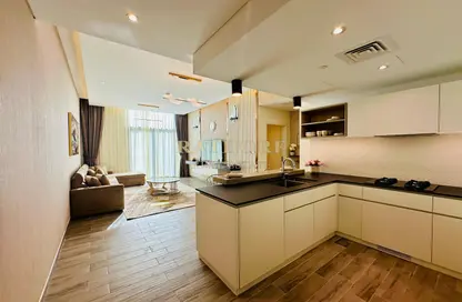 صورة لـ مطبخ شقة - غرفة نوم - 2 حمامات للايجار في بلغرافيا سكوير - قرية الجميرا سركل - دبي ، صورة رقم 1