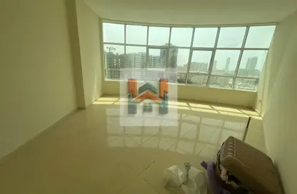 شقة - غرفة نوم - 2 حمامات للايجار في أورينت تاور 2 - أورينت تاور - البستان - عجمان